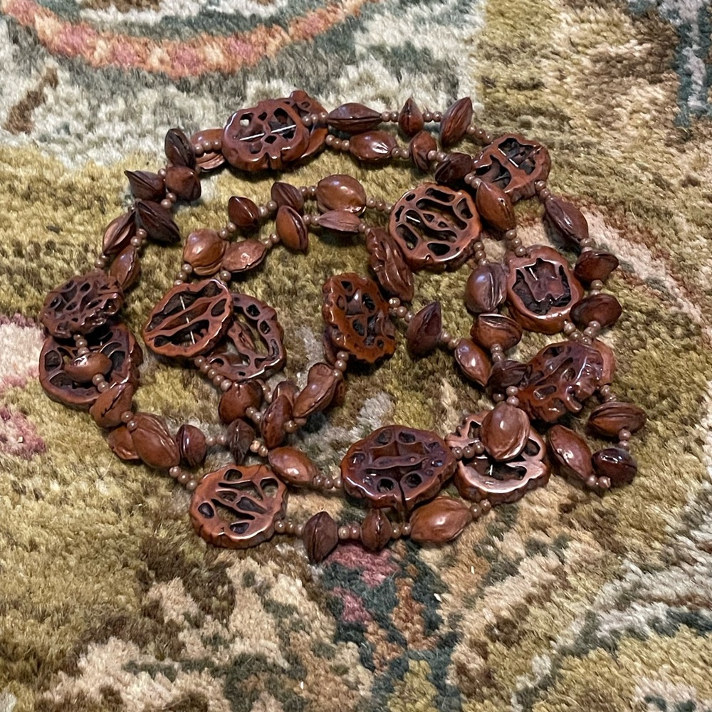 Long polished sliced walnut beaded necklace